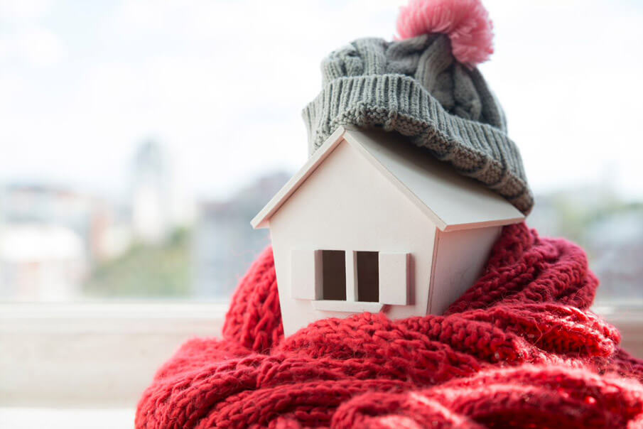 wooden house wrapped in woolen scarf wooden house wrapped in woolen scarf