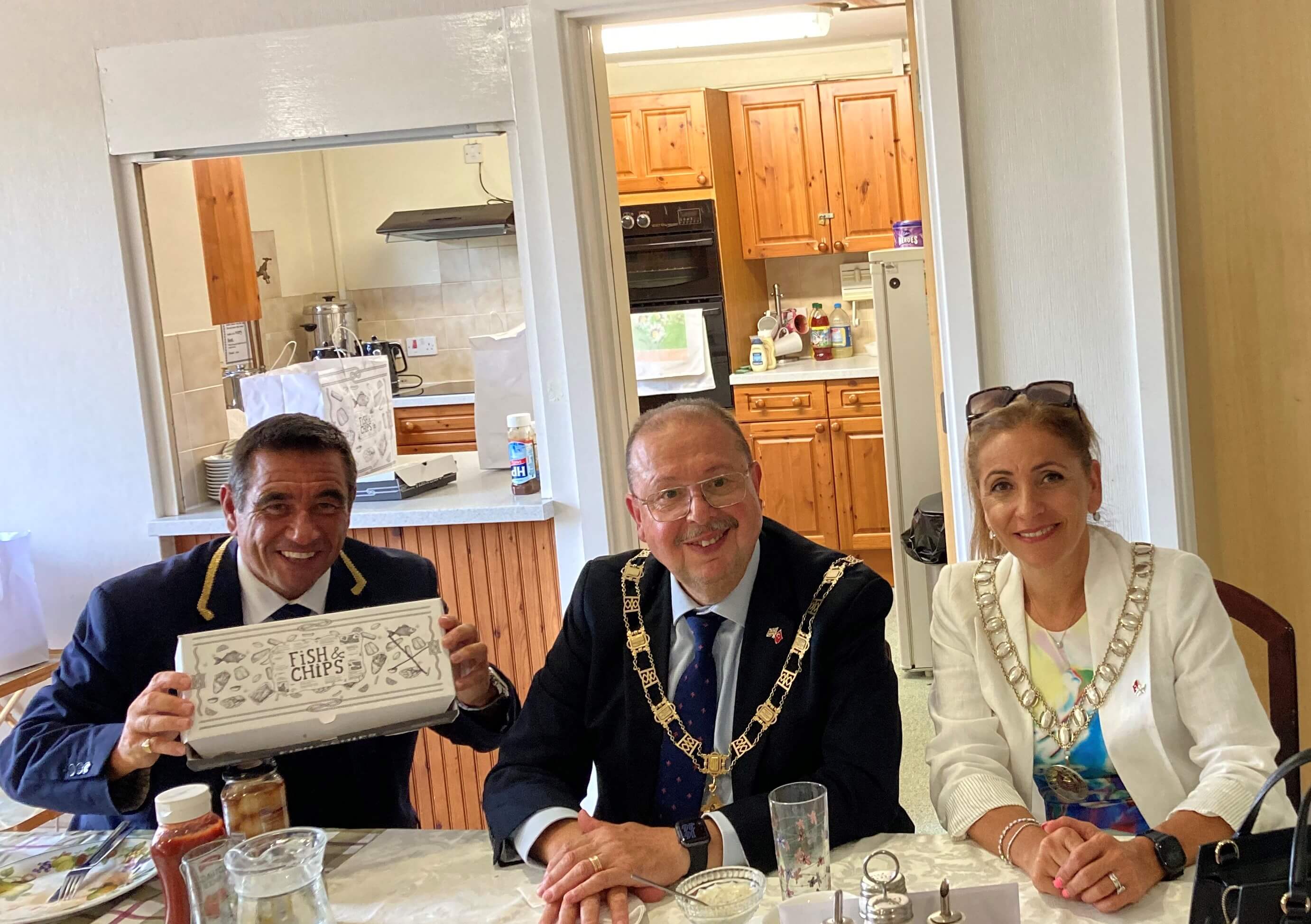 The mayor and mayoress eating in a independent living scheme fish and chips The mayor and mayoress eating in a independent living scheme fish and chips
