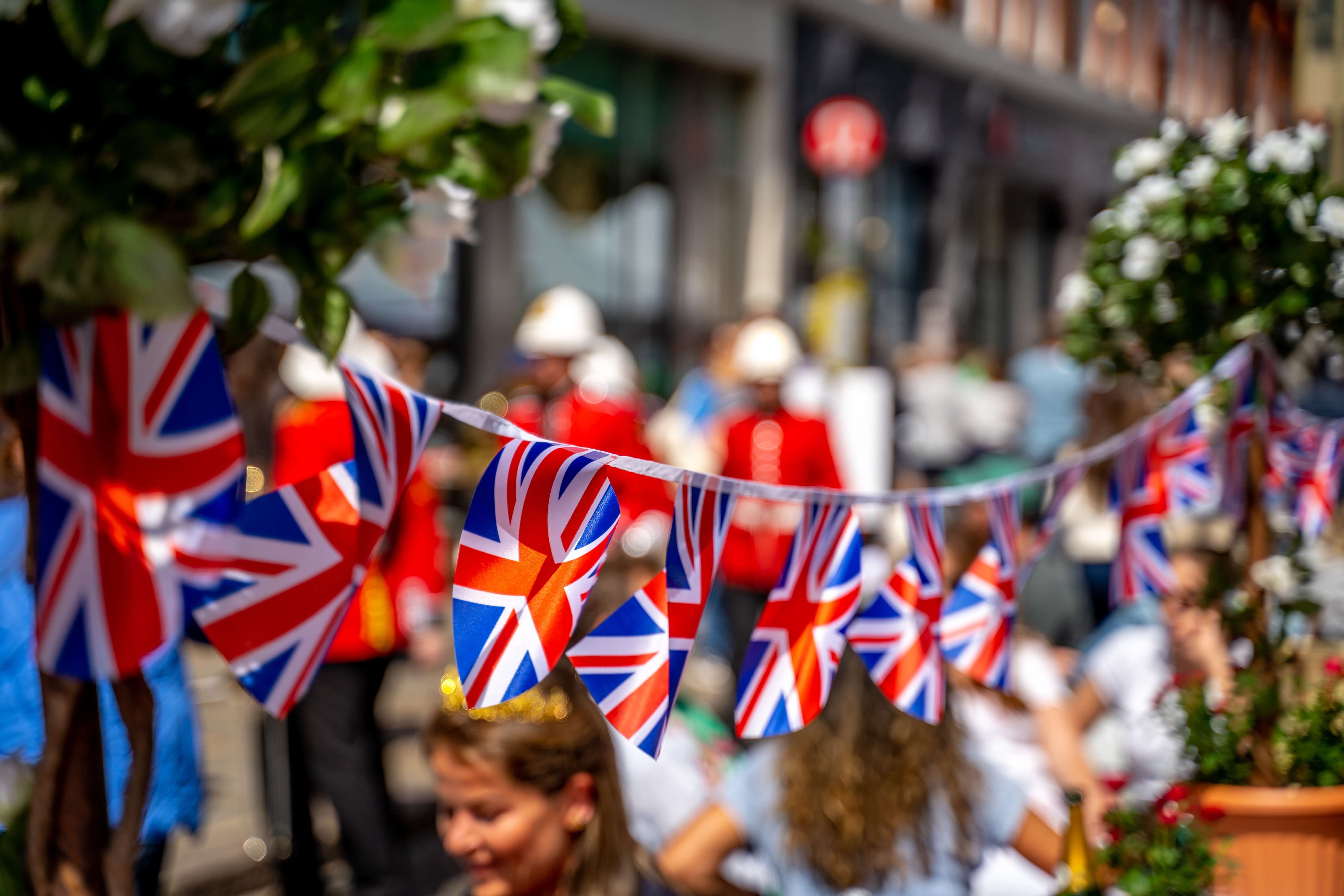 Union Jack flags strung across the street for the Kings coronation