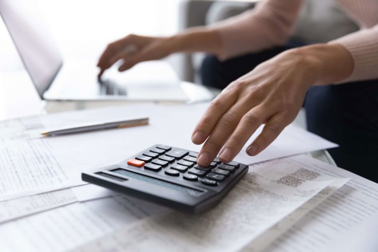 image of someone using a calculator