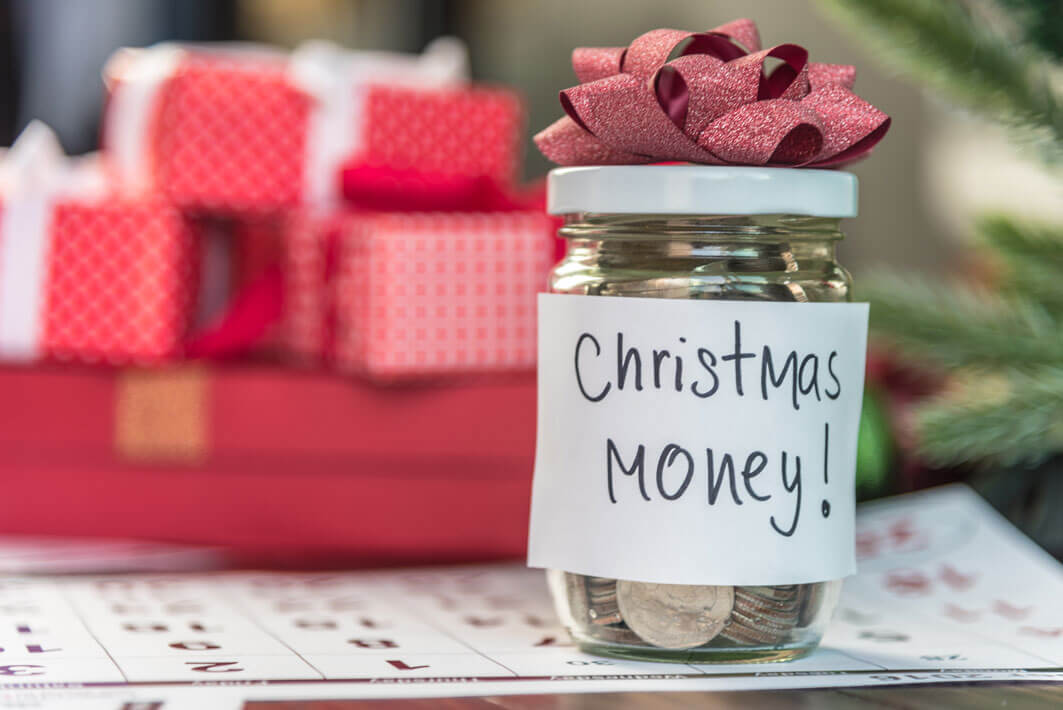 Christmas money in a glass jar Christmas money in a glass jar